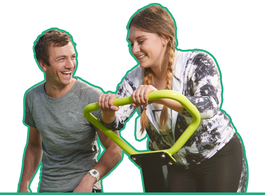 2 people enjoying excercise equipment